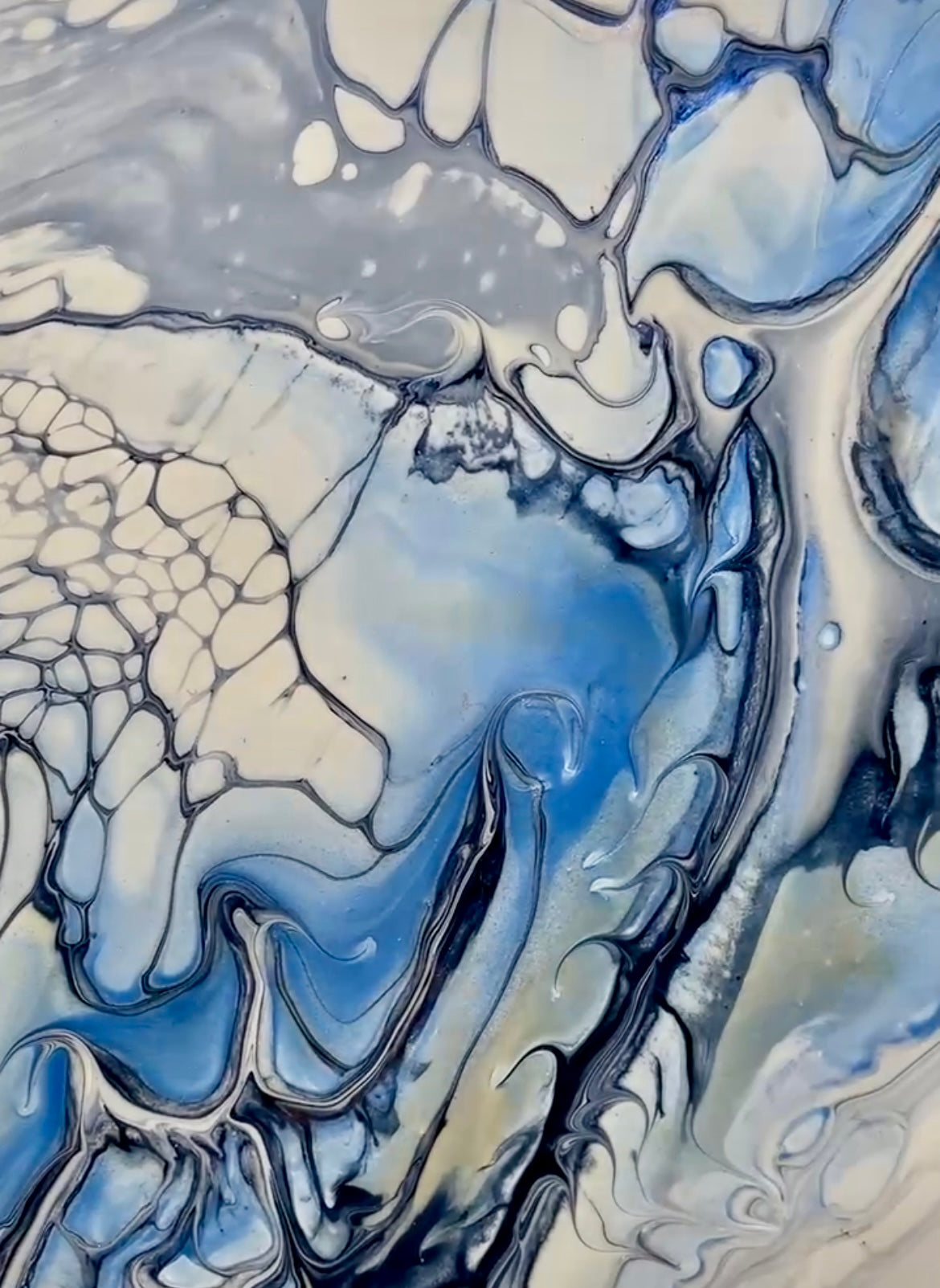 Abstract art with swirling blue and white patterns