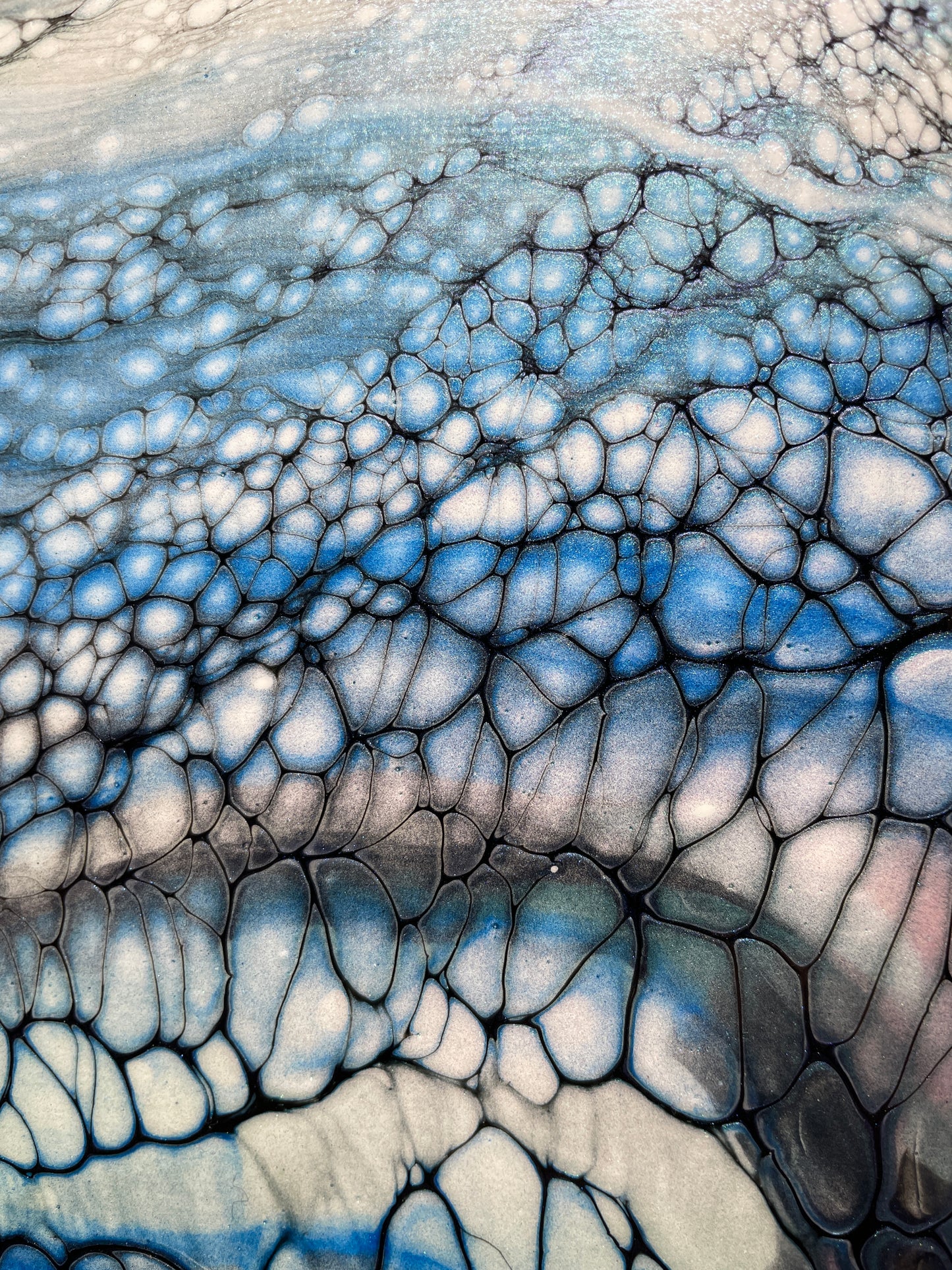 Close-up of a textured surface with blue and white patterns